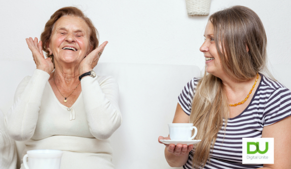 two ladies laughing